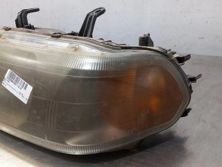 Faro izquierdo MITSUBISHI MONTERO SPORT (K90)