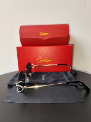 Gafas de sol Cartier negras y plateadas