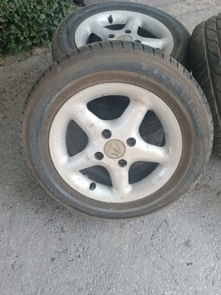 4 Llantas 14 con Neumáticos Firestone