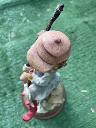 Figura decorativa niño pescador