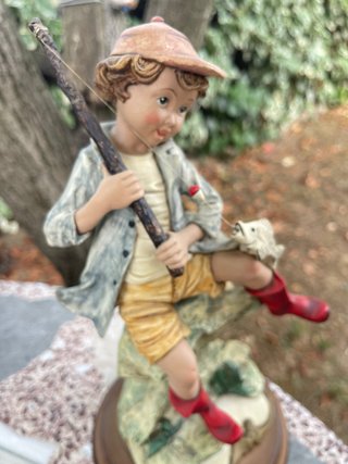 Figura decorativa niño pescador