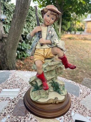 Figura decorativa niño pescador