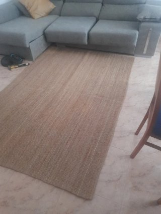 Alfombra de yute beige y marrón