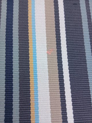 Alfombra exterior rayas beige y azul