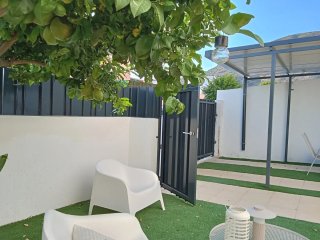 Vallado sobre muro y puertas modelo cliente.