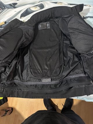 Chaqueta Moto Impermeable Negra y Flúor Alpinestar