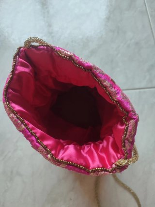 Bolso bombonera fiesta fucsia y dorado