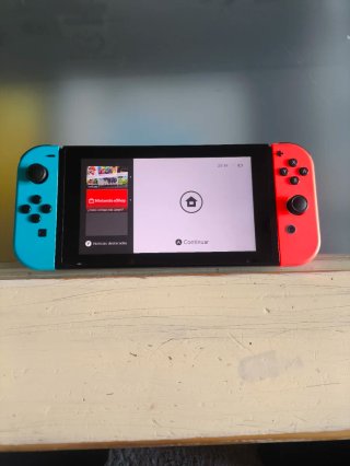 Nintendo Switch Azul y Rojo con Caja