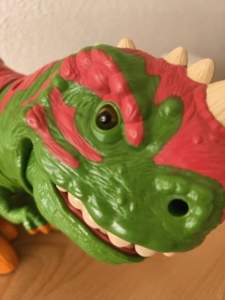 Juguete Dinosaurio Verde y Rosa