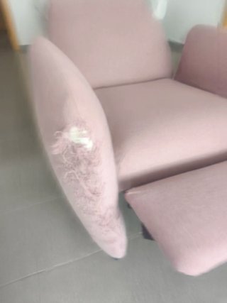 Sofá reclinable rosa de tela