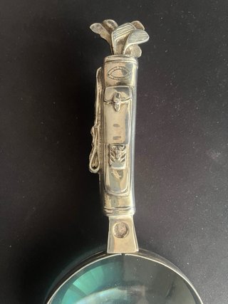 Lupa de plata antigua
