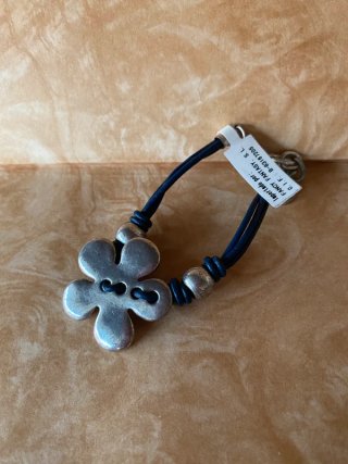 Pulsera azul marino con flor grande estilo vintage