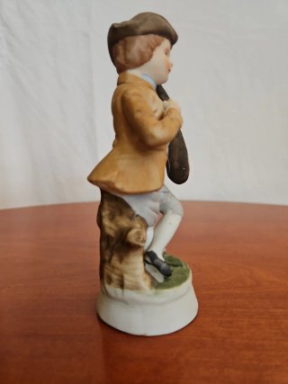 Statuetta vintage bambino con liuto