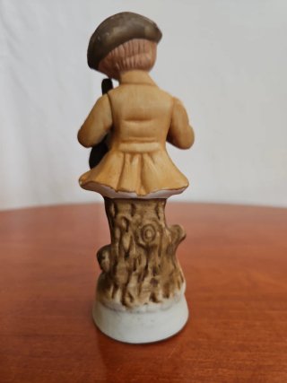 Statuetta vintage bambino con liuto
