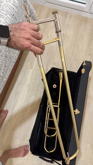 Trombone de varas con caja y sordina