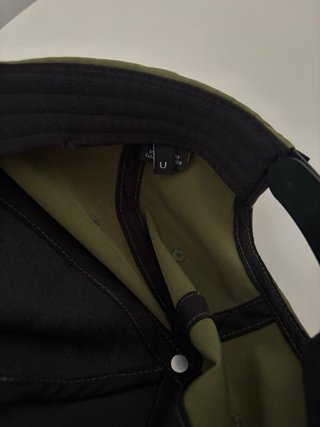 Gorra Millet Verde Oliva y Negra.
