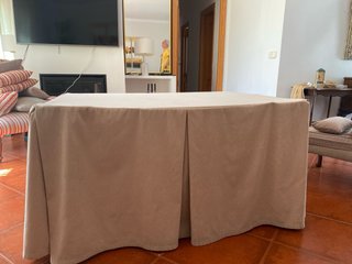 Mesa camilla con falda y radiador