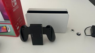 Nintendo Switch OLED Blanca + 4 joycon +accesorios