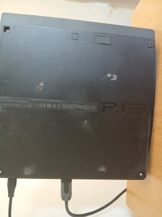 Consola PS3 con juegos y mando