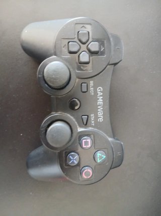 Consola PS3 con juegos y mando