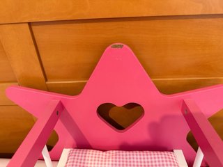 Cuna mecedora rosa para muñeca