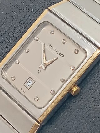 Reloj Bucherer Oro y Acero inoxidable.