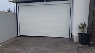 Puerta Seccional con motor   Y panel sándwich 7m