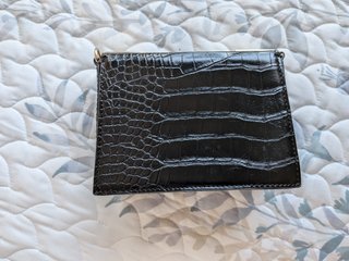 Bolso fiesta piel vegana negro y dorado