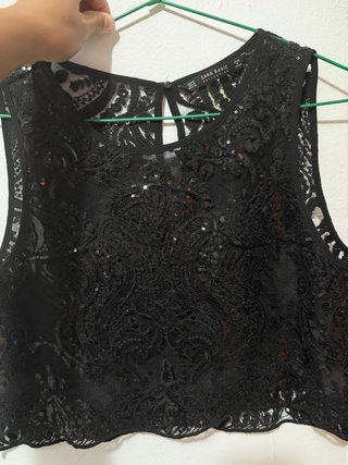 Blusa negra con lentejuelas