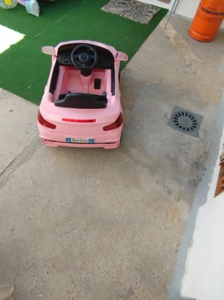 Coche eléctrico infantil rosa BMW