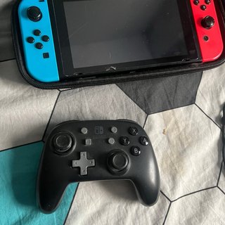 Nintendo Switch Negra, Roja y Azul