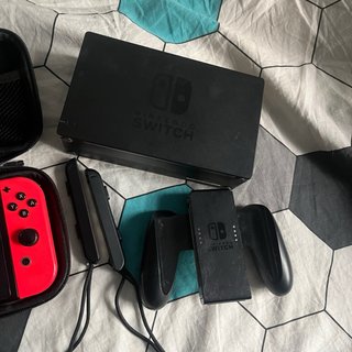 Nintendo Switch Negra, Roja y Azul