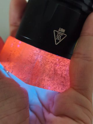 Calcita con Rutilo y fluorescencia