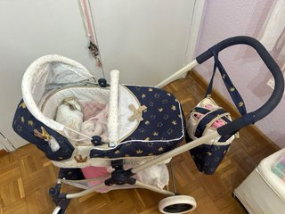 2 Muñecas Reborn con carrito y ropita