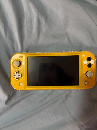 Nintendo Switch Lite Amarillo + Funda Negra