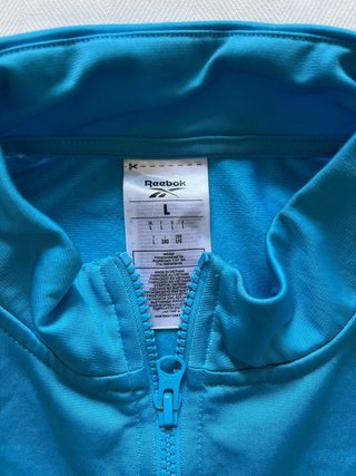 Chaqueta deportiva Reebok retro azul y blanca