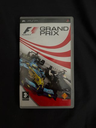 Sony PSP 2000 + cargador + disco F1 Grand Prix.
