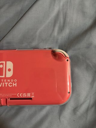 Nintendo Switch Lite Rosa con Funda Blanca