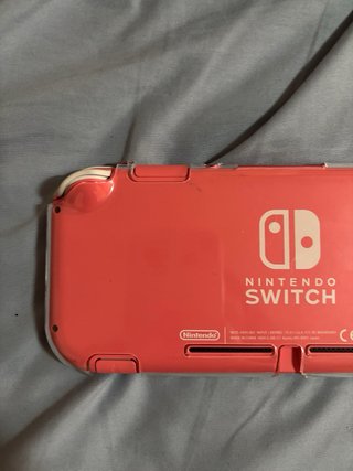 Nintendo Switch Lite Rosa con Funda Blanca