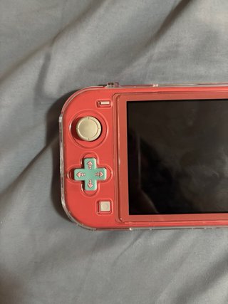 Nintendo Switch Lite Rosa con Funda Blanca