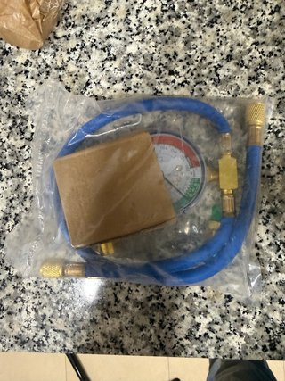 Manguera y boquillas para recarga A/C