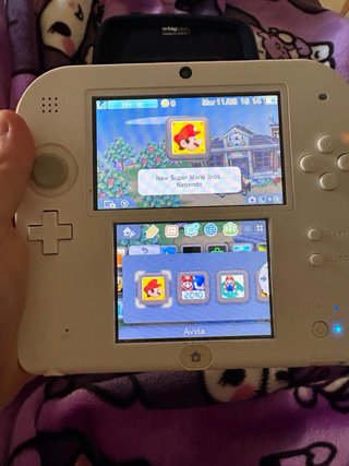 Nintendo 2DS bianca + giochi + accessori