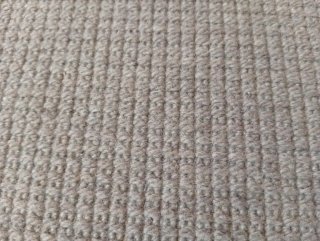 Alfombra de lana gris. Confeccionada a medida.