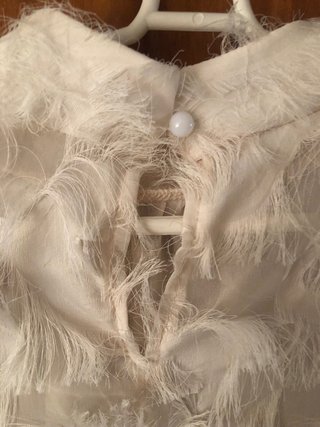 Blusa blanca con flecos