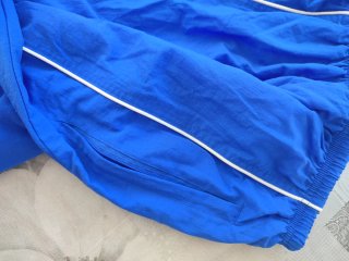 Pantalón chándal azul con cremalleras