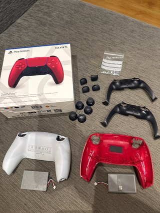Caja original y recambios mando PS5