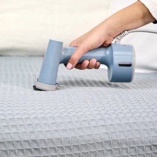 Vaporizador de ropa azul