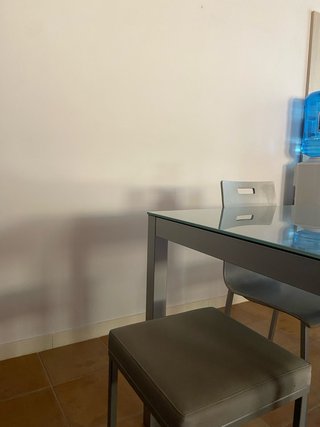 Mesa de cristal con 4 sillas