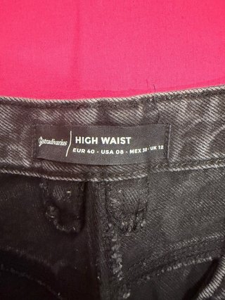 Pantalón corto negro con rayas laterales