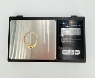 Solitario de oro de 18k circonita, 4.07 g, T-25.
